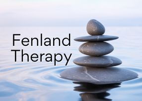 Fenland Therapy stones balancing making a ripple on water